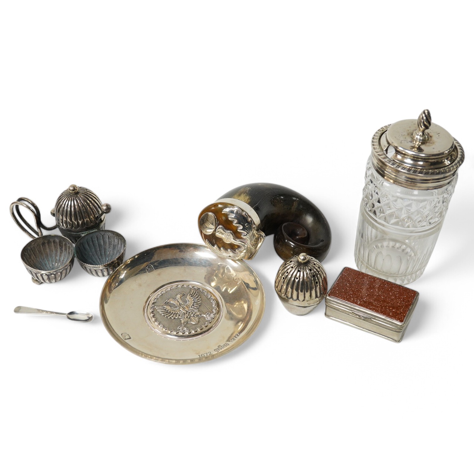 A 19th century white metal mounted horn snuff mull(split), 72mm, a small late Victorian silver cruet stand, a silver topped glass jar, a silver dish, small silver spoon and a white metal pill box. Condition - poor to fai